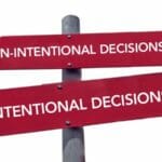 Signs pointing left and right — un-intentional decisions/intentional decisions